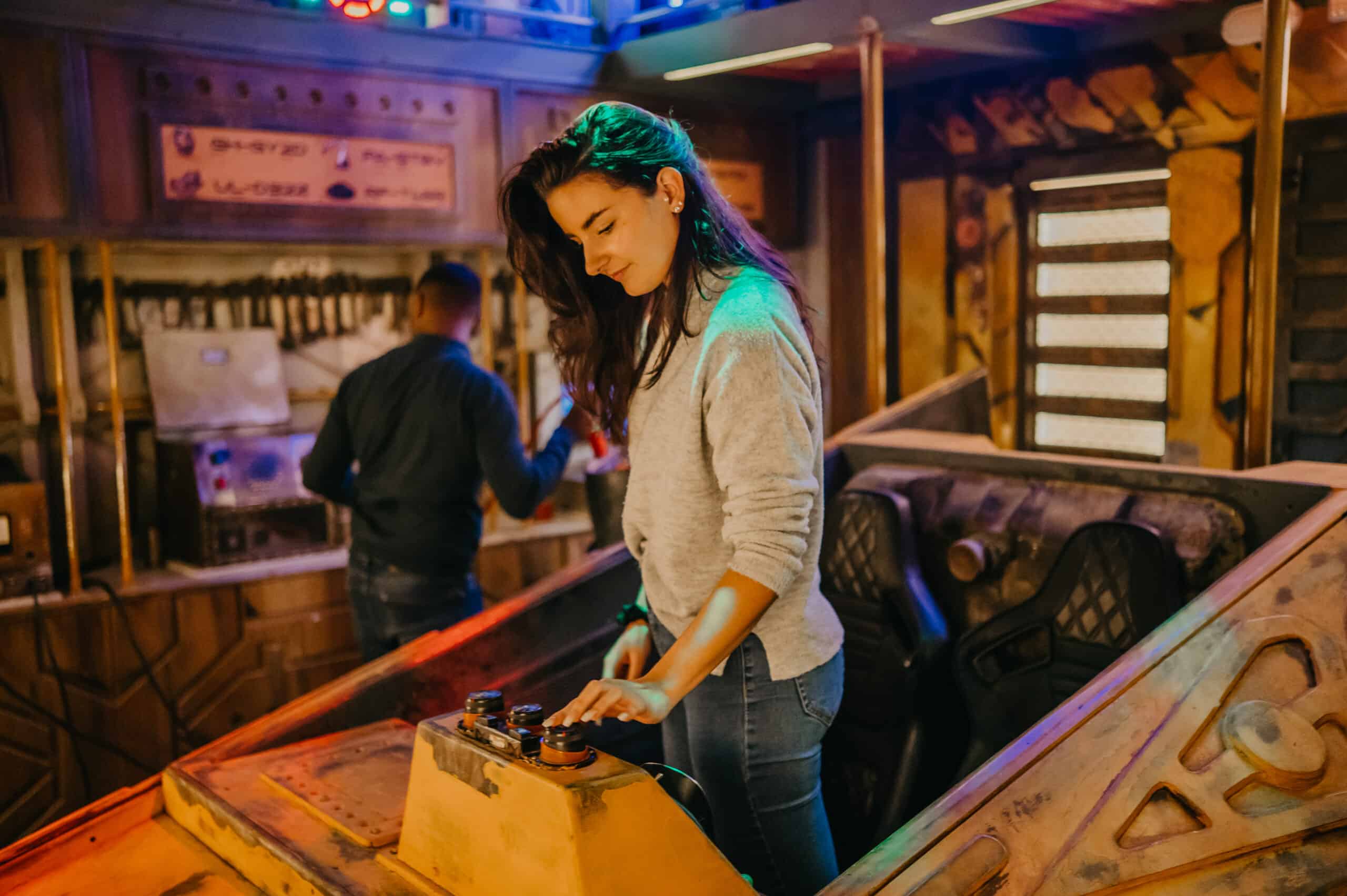 Exciting woman playing an escape room game in Bern's new live escape adventure.